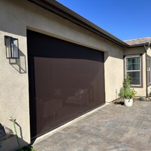 motorized outdoor shade. screen shade on garage